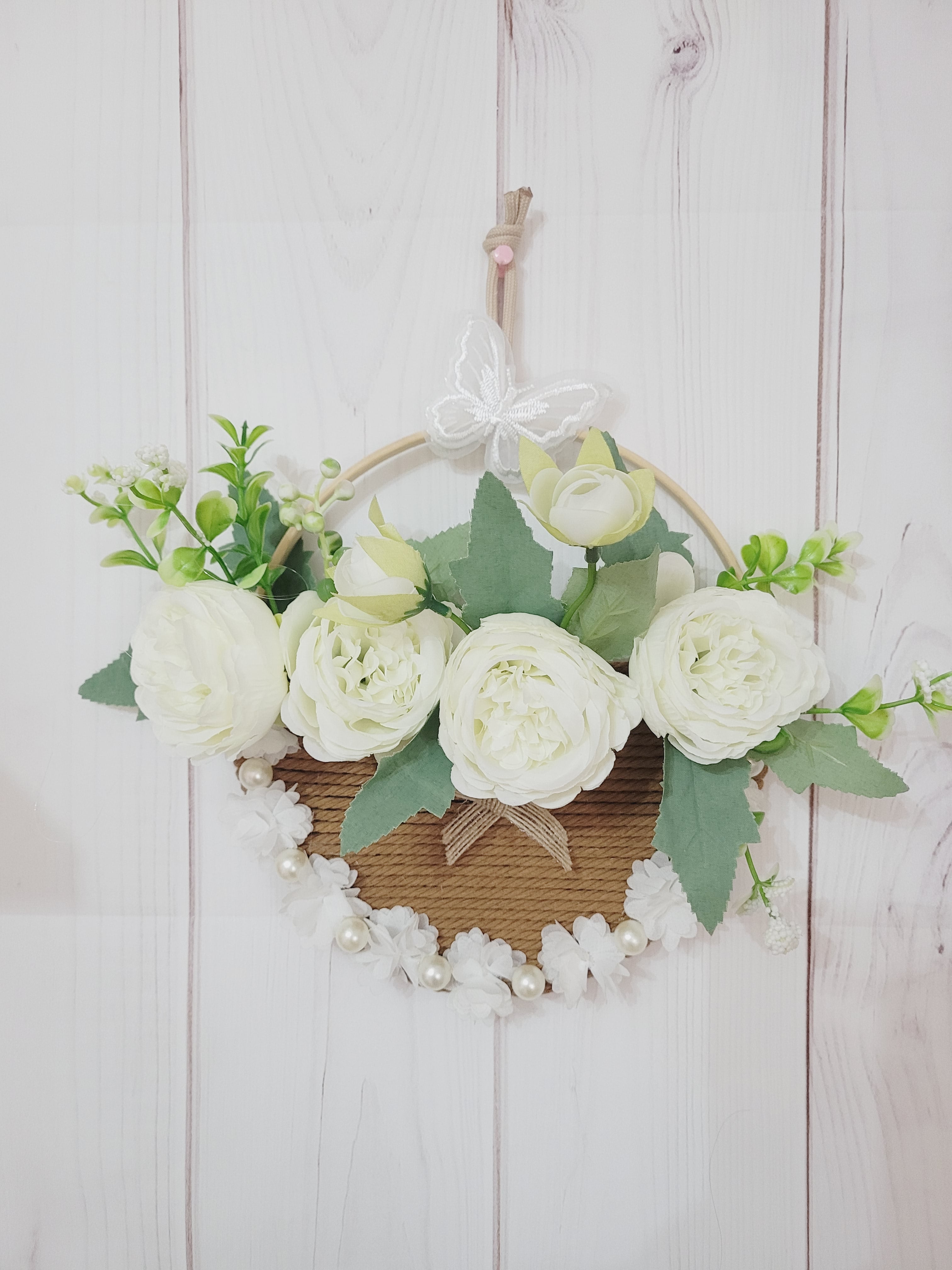 Porte fleurs macramé murale