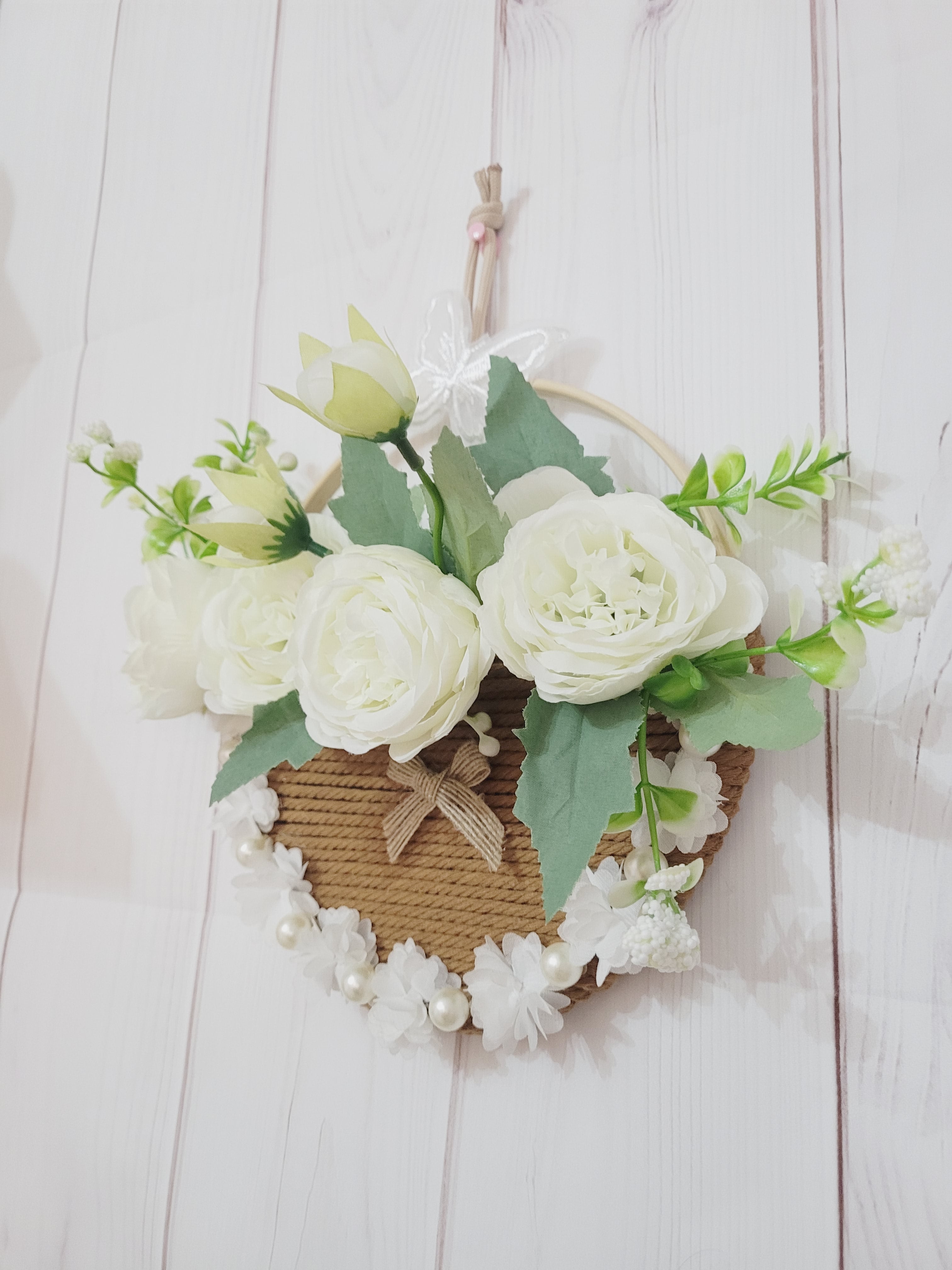 Porte fleurs macramé murale